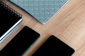 Smartphone, notebook, file on table (Business concept)