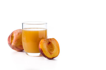 Natural peach juice in glass isolated on white background.Copy space 