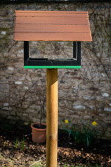 Rustic birdhouse in a garden