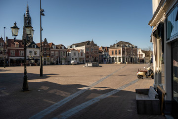 Fototapeta premium Amersfoort, Netherlands - 23 march 2020: Empty city streets due to people self isolating because of the corona virus
