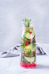 Fresh cool cucumber pomegranate infused water detox drink