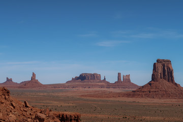 Desert landscape of buttes and monoliths at Monument Valley in Arizona