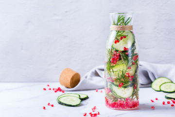 Fresh cool cucumber pomegranate infused water detox drink