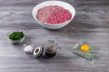 Ingredients for cooking cutlets or burger, Fresh minced meat