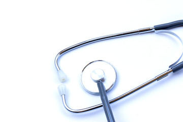 Medical stethoscope on a white background