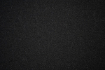 Black paper background with gradient vignette
