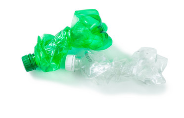 crumpled plastic bottles on wite background
