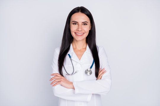 Photo of attractive doctor practitioner lady toothy smiling meet patients consultation reliable person arms crossed wear white lab coat stethoscope isolated grey color background