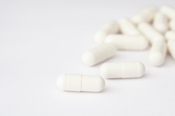 closeup shot of white capsules