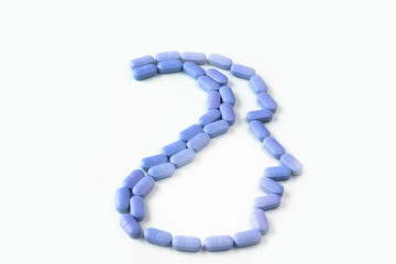 Fototapeta premium HUMAN FACE SHAPED WITH MEDICINE OR PILLS OR TABLETS 