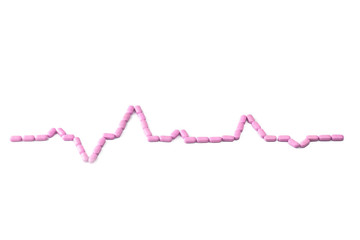heartbeat sign shaped with pills
