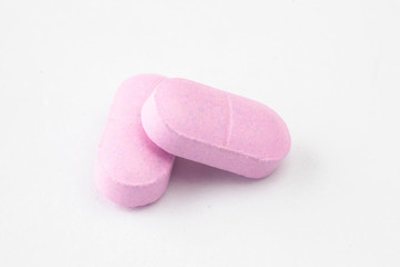 two medicine tables or caplets