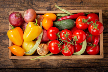 fresh vegetables in a wooden box
