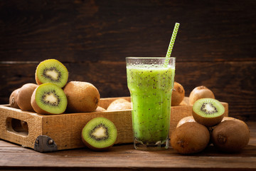 glass of kiwi juice or smoothie with fresh fruits