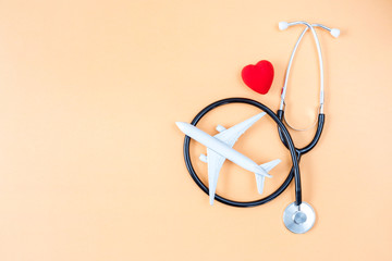 medical tourism concept airplane and stethoscope