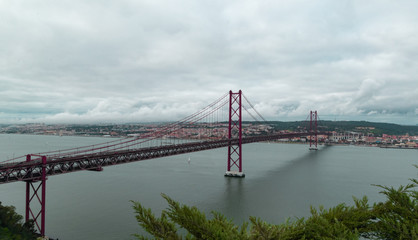 View of 25th April Bridge, from Christ the King Monument. Lisbon, Portugal