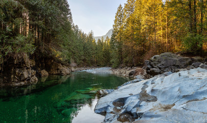 Beautiful Panoramic View of the river in the Canadian Mountain Landscape during a sunny winter day. Taken in Golden Ears Provincial Park, near Vancouver, British Columbia, Canada.