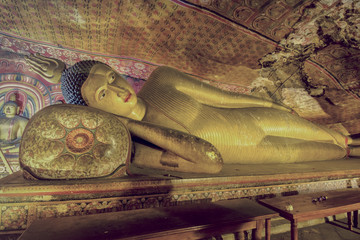 5th Century Dambulla Cave Temple And Statues In Dambulla, Sri Lanka. Dambulla Cave Temple Is The Largest And Best Preserved Cave Temple Complex In Sri Lanka (With Computer Color Effects)