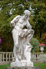 Fototapeta na wymiar Statue of Marius standing on the ruins of Carthage, Louxemburg Gardens, Paris, France. September 2019