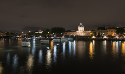 Fototapeta na wymiar The Seine river in Paris (France). View to Institut de France. September 2019