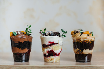 Very beautiful and appetizing traily closeup on table with space for signatures. Cake