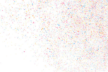 Abstract explosion of confetti. Colorful grainy texture isolated on white background. Colored stains and blots. Vector overlay elements. Digitally Generated Image. Illustration, Eps 10.