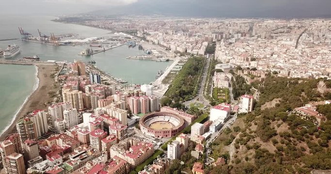 Malaga with Placa de Torros from castle in sunny time. Andalusia, Spain 