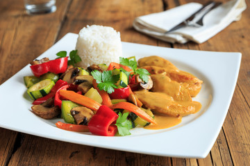 chicken with rice and  vegetables
