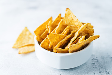 Corn chips in a white bowl