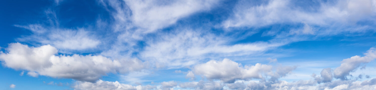 Beautiful Panoramic View of Cloudscape during a colorful and sunny winter day. Taken on the West Coast of British Columbia, Canada.