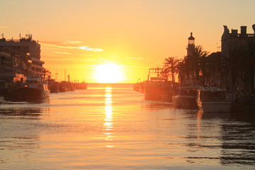 Fototapeta premium Amazing sunset in Le Grau du Roi, a seaside resort on the coast of occitanie region in France
