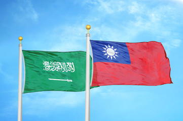 Saudi Arabia and Taiwan two flags on flagpoles and blue cloudy sky