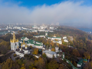 Beautiful, foggy, morning, autumn top view of the Kiev Pechersk Lavra. Kiev.