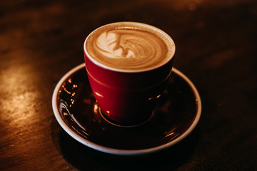 cup of coffee on black background