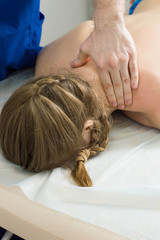 Fototapeta na wymiar Close-up of man's hands do massage of a woman's neck