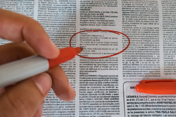 person seeking employment in classifieds. concept of employment recruitment