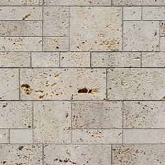 Seamless masonry texture of the wall of old building made of blocks of weathered stone. Stuttgart. Germany.