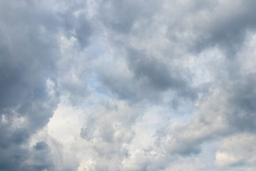 Gray clouds completely cover the sky, background for design