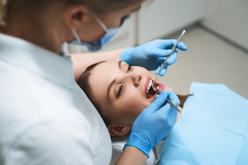 Woman having appointment with dentist stock photo
