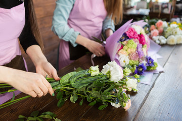 Master class on making bouquets. Spring bouquet. Learning flower arranging, making beautiful...