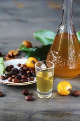 Liqueur nespolino. Loquat seed liquor. tincture alcoholic on bones loquat . Amaretto with almond flavor. recipe for medlar. alcoholic beverage from the  loquat. tincture on seed loquat. 