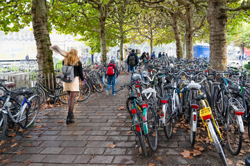 Ghent/Belgium - October 10, 2019: Bicycle parking in front of the Gent-Sint-Pieters railway station.