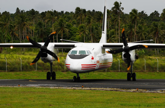 VAVAU, TONGA - NOVEMBER 17: Realtonga Airplane Arrives At Vavau Airport On November 17, 2013 In Tonga. REALtonga Airline Provides Scheduled Air Services To All Of Tongan Local Airports.