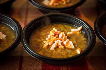 hot soup in a disposable container,for delivery of food at home