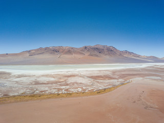 Fototapeta na wymiar Pacana Caldera, San Pedro de Atacama, Andes Desert lake and salt flats