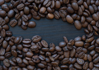 Natural coffee beans, close-up, top view.