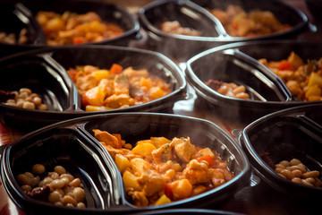 hot dishes.meat and potatoes in a disposable container,for delivery of food at home