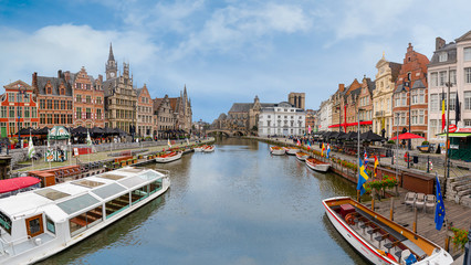 Ghent/Belgium - October 10, 2019: Cityscape with view of Sint-Michielsbrug, Stone arch bridge in...