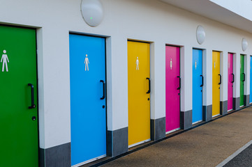Brightly coloured public toilet doors