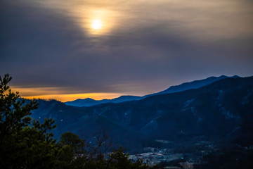 Fototapeta premium orange sunrise in the mountains